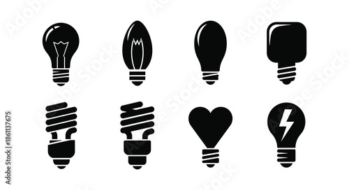 A collection of diverse light bulb designs presented as a striking black silhouette