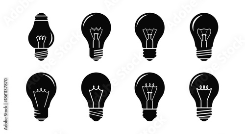 A collection of diverse light bulb designs presented in a stark black silhouette