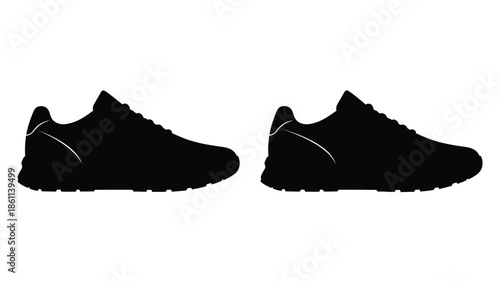 Pair of athletic shoes displayed in a striking black silhouette