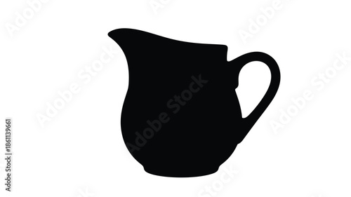 A striking black silhouette of a classic creamer pitcher