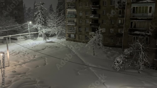 The city sleeps on a snowy night