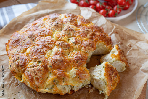 Party bread with herb butter and cheese topping