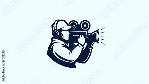 Cameraman filming with vintage movie camera professional videographer at work.