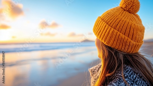 Wallpaper Mural Carefree young woman enjoys beach walk at sunset with vibrant knit hat Torontodigital.ca