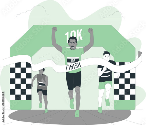 Man crossing the finish line at a 10K race with checkered flags and other runners