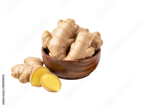 Freshly harvested ginger root in a rustic wooden bowl, showcasing its natural texture