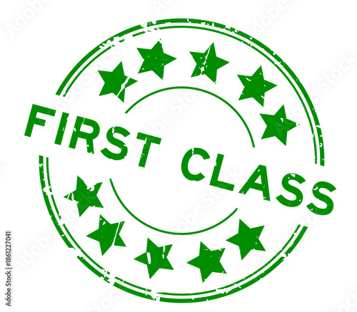 Grunge green first class word with star icon round rubber seal stamp on white background