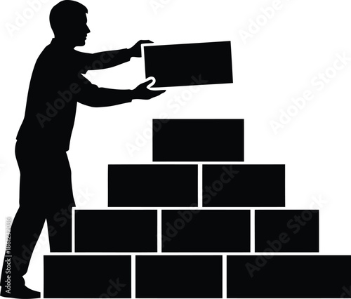 Silhouette of construction worker carefully placing a brick to build a stable pyramid structure representing growth and foundation
