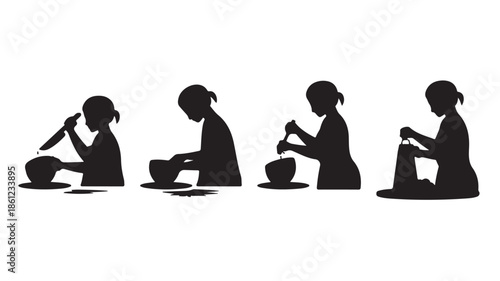 Silhouette of woman doing pottery on wheel in studio