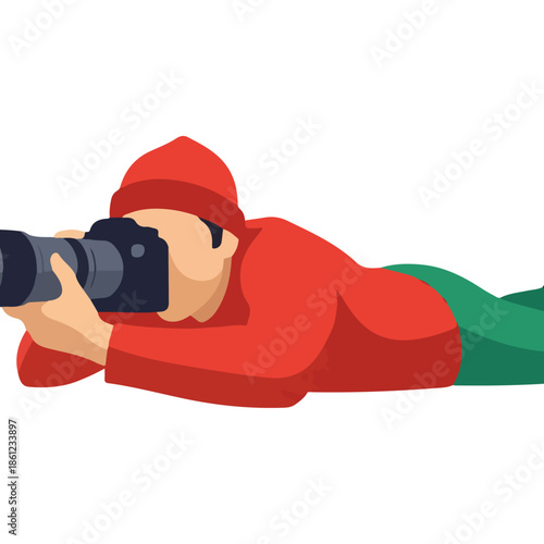 Photographer lying down taking a picture.