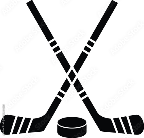 Crossed hockey sticks with puck