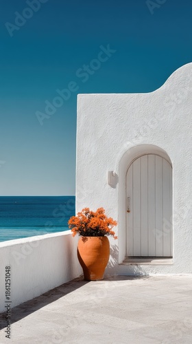 Mediterranean style exterior with ocean view and orange flowers