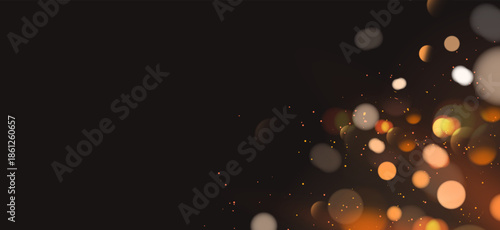Warm Glowing Light Orbs and Spark Particles Clustered on Dark Background for Festive Celebration Design