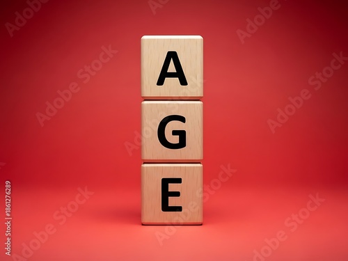 Vertical stack of wooden letter blocks spelling the word AGE against a vibrant red background representing life stages, demographics, and aging process.
