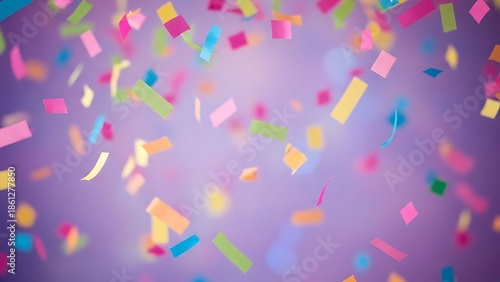 Colorful paper confetti falling against a soft purple background, festive celebration, birthday, and party decoration concept.