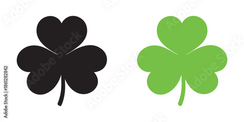 Black and Green Four-Leaf Clovers Side by Side