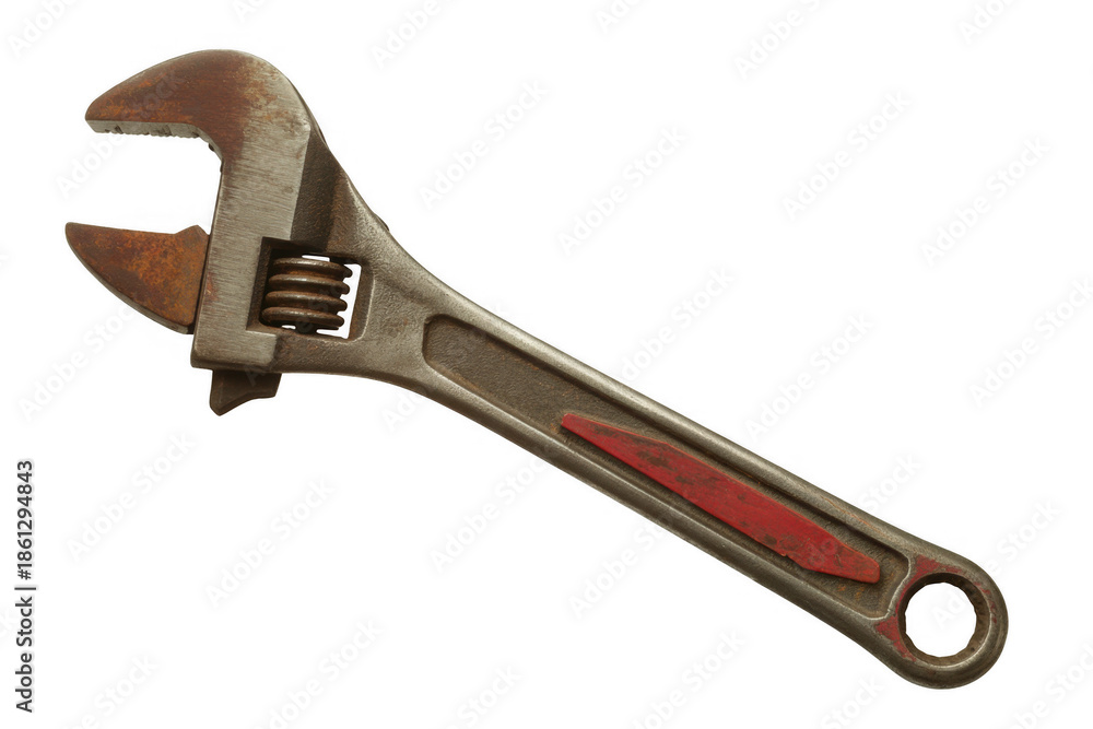 Obraz premium Rusty old adjustable wrench with red handle isolated on a transparent background