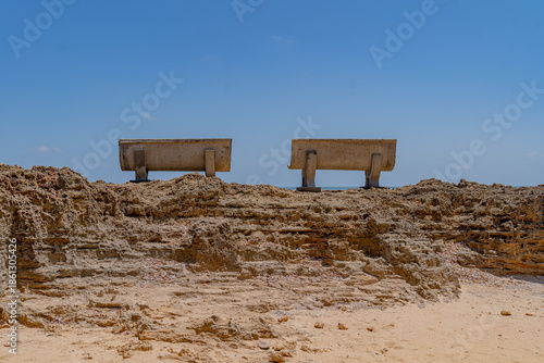 Two empty seats facing the sky