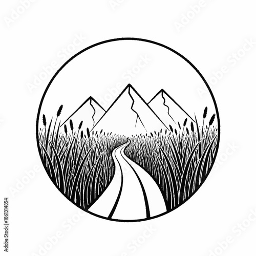 Winding path through tall grass leading to majestic mountains.