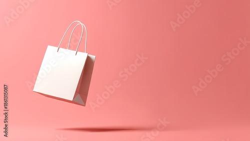 A white paper shopping bag floating against a solid coral pink background perfect for retail marketing and sales promotion graphics.