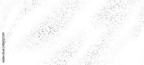 Abstract halftone dots background with smooth gray gradient effect on white space. Minimal and modern design suitable for banner, poster, presentation, wallpaper, web background, brochure