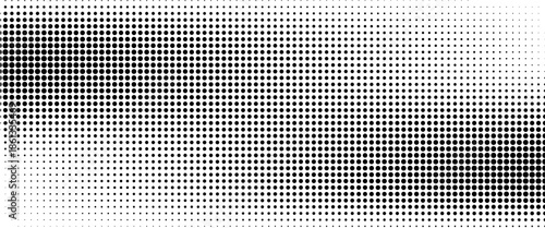 Dotted halftone gradient texture. Fading polka dot background. Repeated dots gradation pattern background.