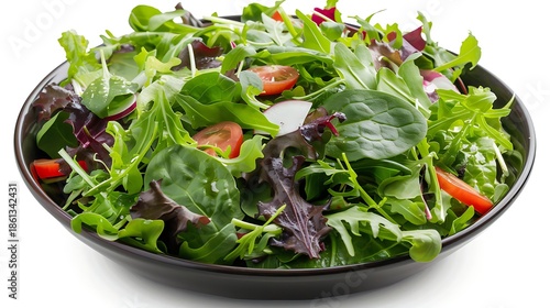 A bowl of fresh mixed greens with a light vinaigrette dressing
