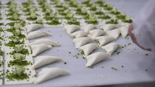 Boiling Traditional Turkish Antep Baklava by Pouring Boiled Syrup Video, Eminonu Istanbul, Turkiye (Turkey)