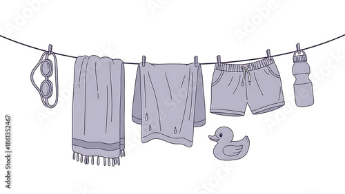 Summer Clothes and Accessories Drying on a Clothesline