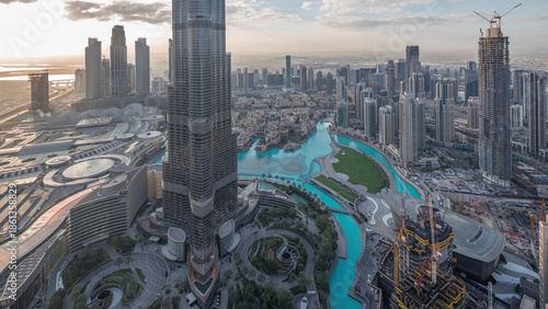 Obraz na plátně Amazing aerial view of Dubai downtown skyscrapers night to day timelapse, Dubai,