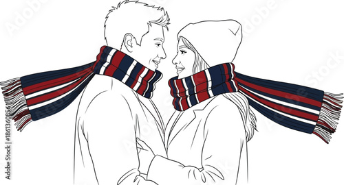 Happy couple wearing matching striped winter scarves and warm clothing sharing a sweet moment together