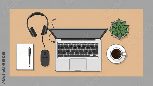 Overhead view of laptop computer with headphones mouse notepad pen coffee cup and potted