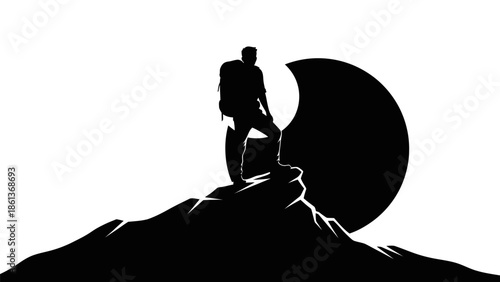 Silhouette of a Hiker Standing on a Mountain Peak.