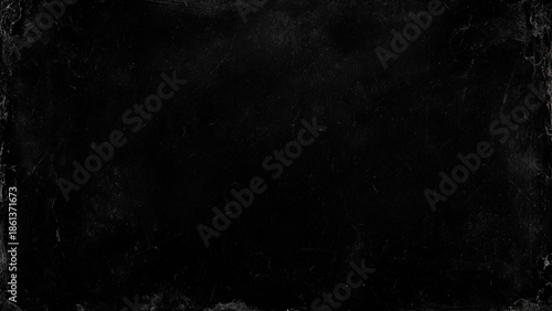 dark black marble textured surface with scratches and marks