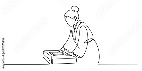 Elegant continuous line drawing of a woman engaged in a calm, focused activity