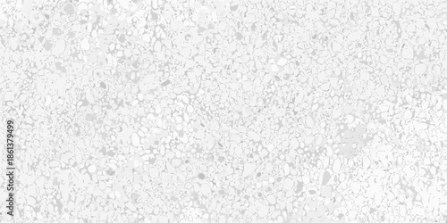 Abstract white texture with speckled pattern resembling grainy stone or concrete