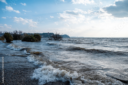 The waves crash against the shore of Dianchi Lake, located in Kunming, Yunnan, China.