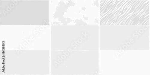 Abstract grid of varying gray shades and a single white section