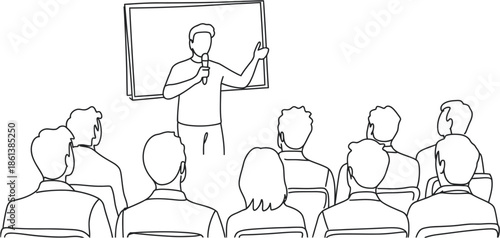Professional speaker addresses an attentive audience during a business presentation or seminar