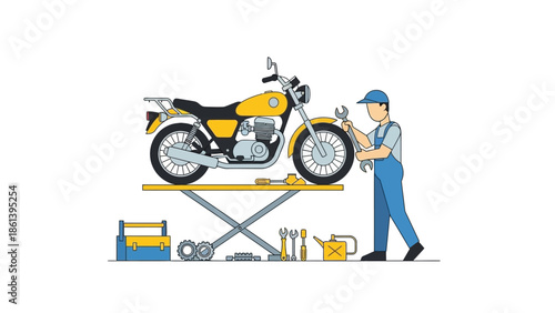 Motorcycle repairman fixing a yellow motorcycle on a lift