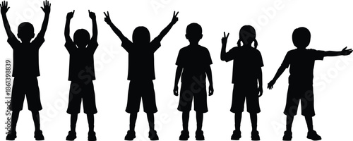 Silhouettes of happy children standing in a row expressing joy and victory with raised arms for youth education and childhood