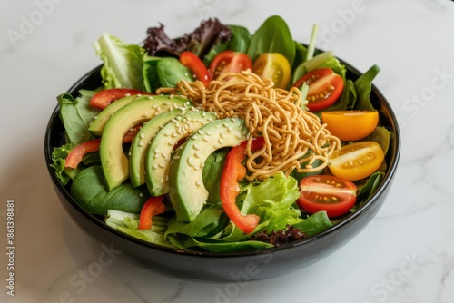 Wallpaper Mural Fresh mixed green salad with avocado tomatoes and crispy noodles mixed greens cherry tomato Torontodigital.ca