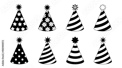 Collection of black and white party hats with various festive patterns and toppers
