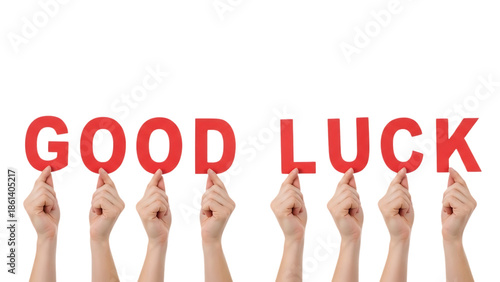 Hands Holding Up the Words Good Luck on Black Background