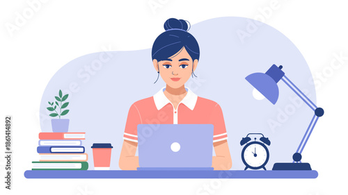 Young woman working on laptop at a desk with books and lamp, focused on her tasks