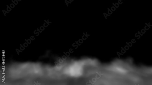 Dark black background with low lying gray smoke or fog spreading softly along bottom creating mysterious dramatic mood, cinematic atmosphere, Concept of mystery, darkness, danger and suspense
