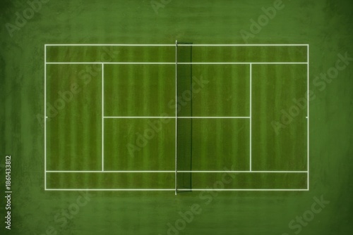 Aerial view of a green tennis court with white boundary lines white lines sports