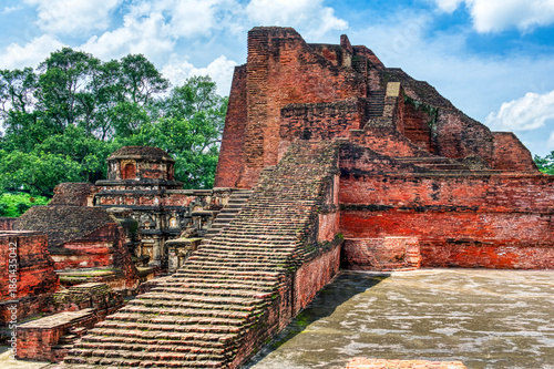 Nalanda University ruins in Bihar reveal a vast ancient learning center, founded in the 5th century CE, famed for monasteries, libraries, and global Buddhist scholars.