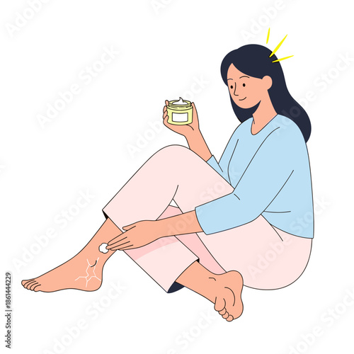 Woman applying cream to cracked heels while sitting on floor  