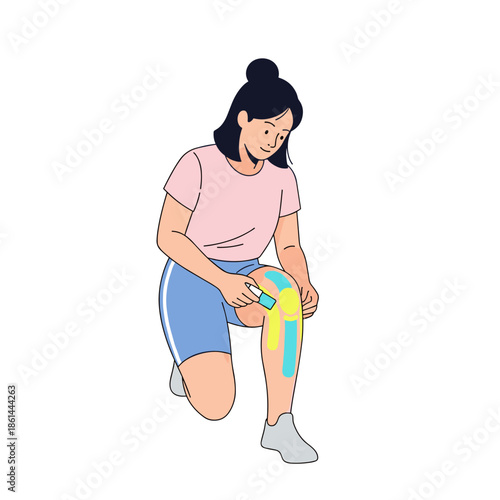 Woman applying kinesiology tape to her knee while kneeling  